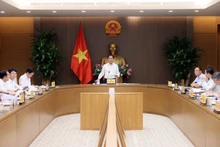 范明正总理主持会议。（图片来源：baochinhphu.vn）