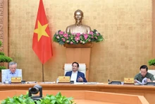 范明正总理主持会议。