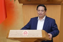 范明正总理主持会议。（图片来源：baochinhphu.vn）