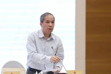 越南国家银行副行长段泰山发表讲话。（图片来源：qdnd.vn）