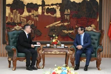 越南政府总理范明正会见中国天虹国际集团有限公司董事会主席洪天祝。
