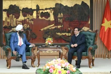 范明正总理会见加拿大国际发展国务秘书兰迪普·萨莱