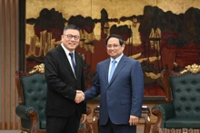 越南政府总理范明正会见中国天虹国际集团有限公司董事会主席洪天祝。