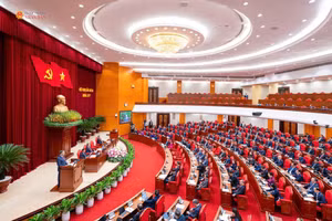 越共十四届三中全会第二天议程场景。