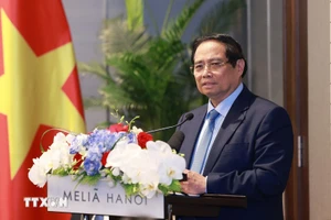 范明正总理在会上发表讲话。（图片来源：越通社）