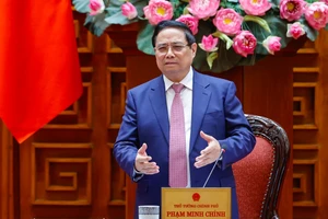 范明正总理发表讲话。（图片来源：VGP）