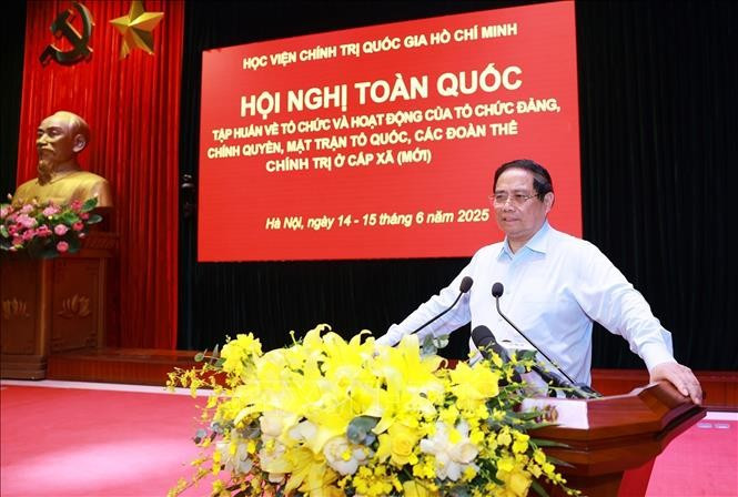 范明正总理在会上发表讲话。（图片来源：越通社）