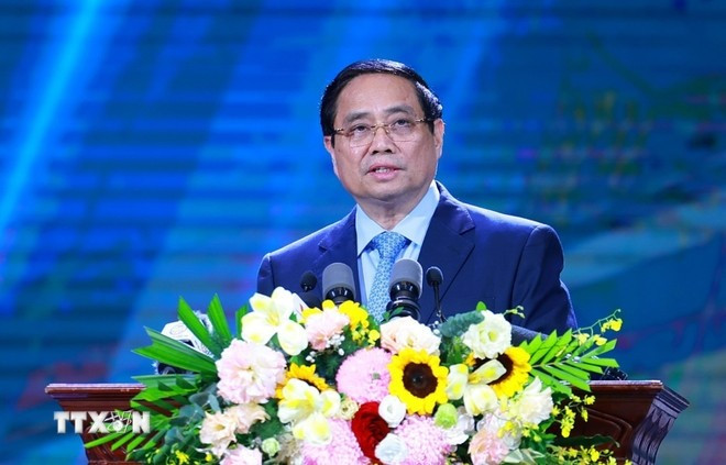 范明正总理在会上发表讲话。(图片来源:越通社)