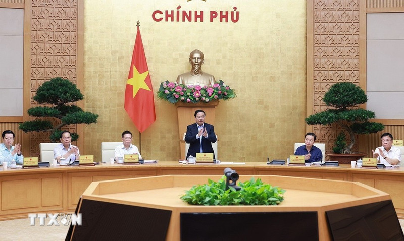 越南政府总理范明正主持会议。（图片来源：越通社）