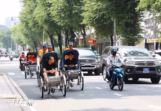 国际游客参观胡志明市。（图片来源：越通社）