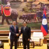 越南国家审计署审计长阮友义和老挝政府总理宋赛·西潘敦。（图片来源：越通社）