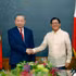 越共中央总书记、国家主席苏林与菲律宾总统费迪南德·罗慕尔德兹·马科斯。（图片来源：越通社）