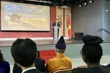 越南外交部常务副部长阮明宇在活动上发表讲话。(图片来源:越通社)