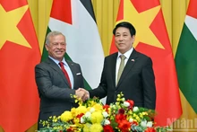 国家主席梁强与约旦国王阿卜杜拉二世·本·侯赛因。