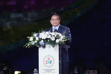 范明正总理在活动上发表讲话。