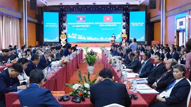 越南司法部与老挝司法部联合举行越老边境省份第五次司法扩大会议。（图片来源：越通社）