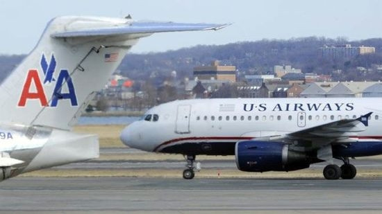 图为美国航空(American Airlines)与全美航空集团(US Airways)客机。