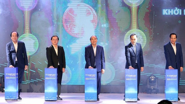 越南政府总理阮春福出席开幕式。（图片来源：越通社）