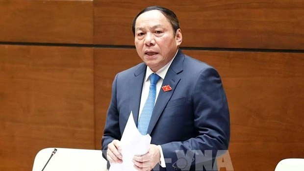 文化体育与旅游部长阮文雄答复质询。（图片来源：越通社）