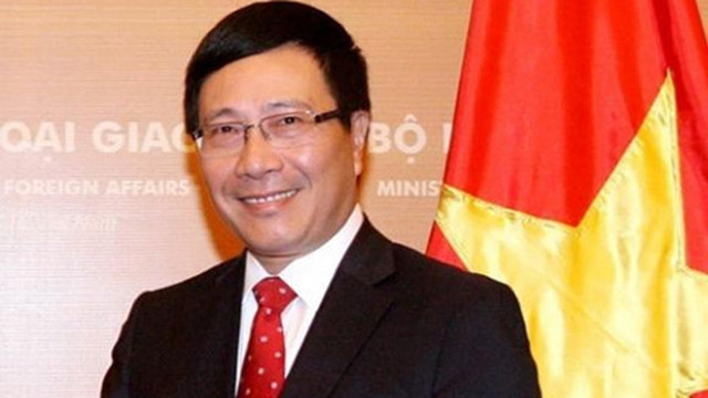越南政府副总理兼外交部长范平明。