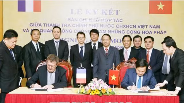 越南与法国关于加强反腐败的合作协议签署仪式。（图片来源：越通社）