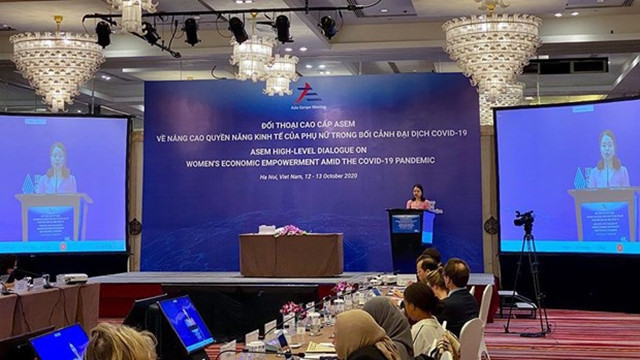 “新冠肺炎疫情背景下促进妇女经济赋权”的高级对话场景。（图片来源：越通社）