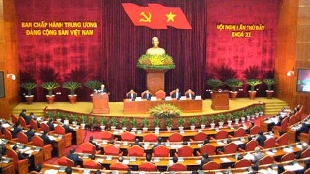 越南共产党第十一届中央委员会第七次会议开幕式全景。 (Photo: 图片来源：越通社)