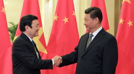 越南国家主席张晋创同中国国家主席习近平举行会晤。