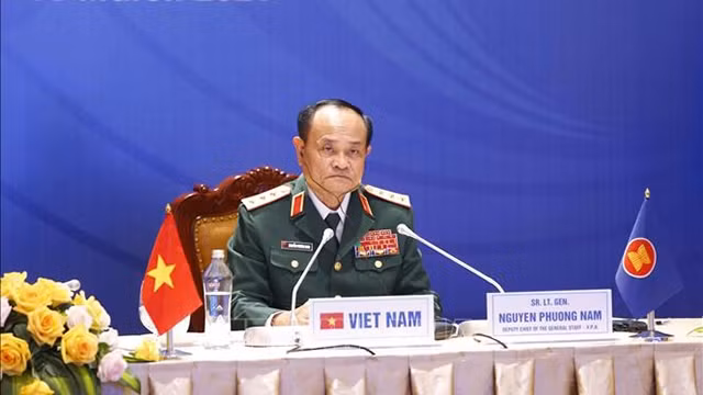 阮方南上将出席会议。（图片来源：越通社）
