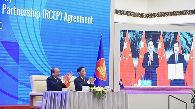 《区域全面经济伙伴关系协定》签字仪式。（陈海 摄）