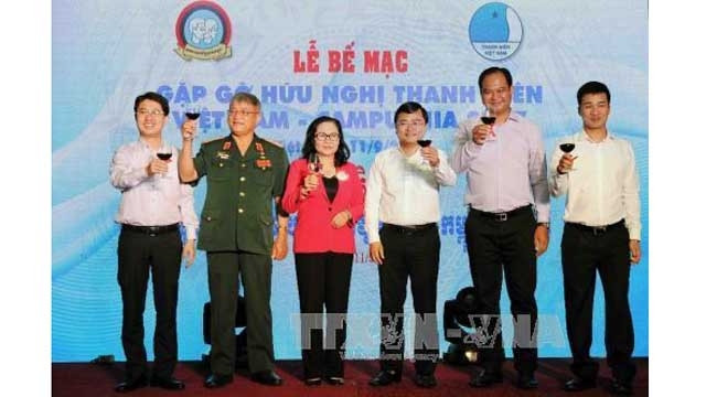 越柬青年友好会见活动闭幕式。（图片来源：越通社）