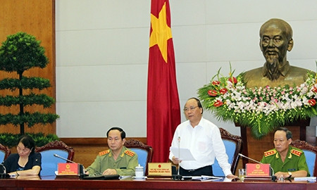 阮春福副总理在会上发表指导性讲话。 (Photo: 图片来源：人民公安报网)