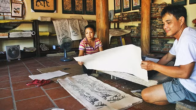 附图：民间年画制作。