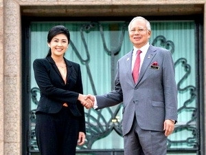 马来西亚政府总理纳吉会见泰国总理英拉·西那瓦 。 (Photo: 图片来源：越通社)