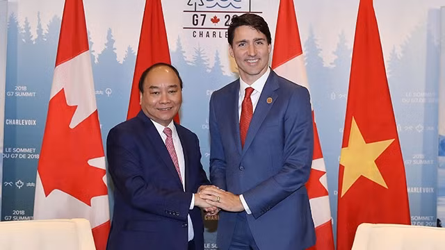 阮春福总理和加拿大总理贾斯汀•特鲁多。（图片来源：越通社）