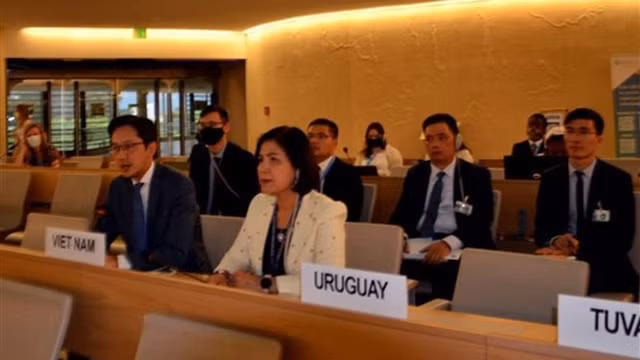 越南代表团出席讨论会。（图片来源：越通社）