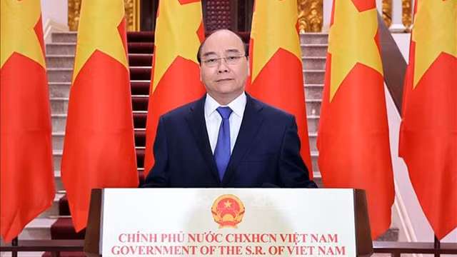 越南政府总理阮春福在开幕式上发表视频致辞。