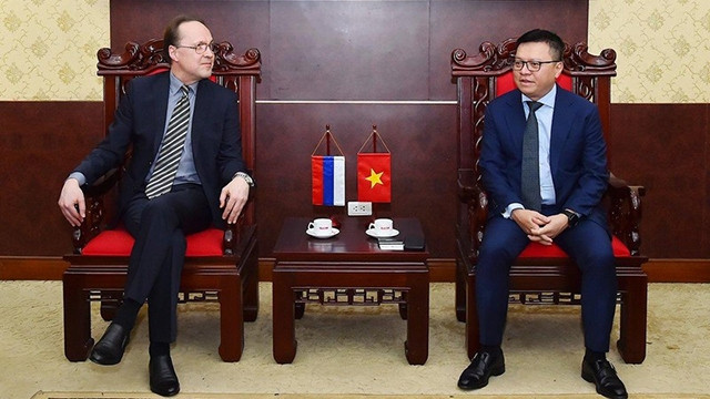 黎国明总编辑会见根纳季·贝兹德科。