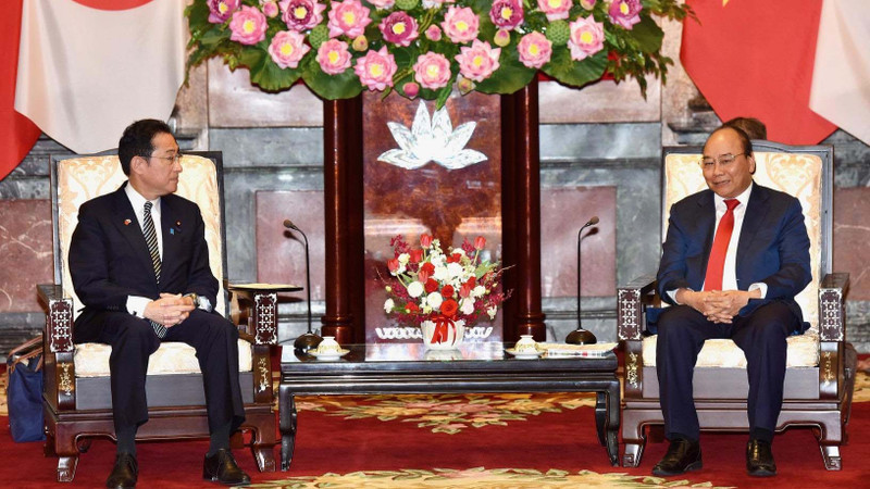 越南国家主席阮春福会见日本首相岸田文雄。（陈海 摄）