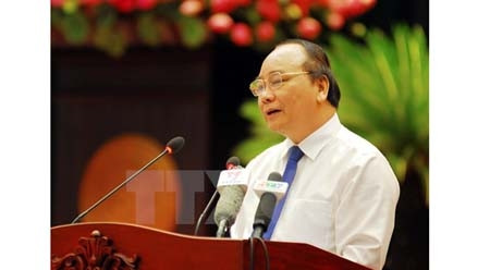 阮春福副总理发表讲话。（图片来源：越通社）