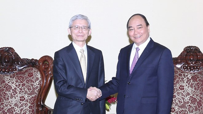 阮春福副总理会见丰田集团执行副总裁小田邦彦。