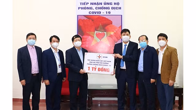 援助资金接收仪式。（图片来源：越通社）