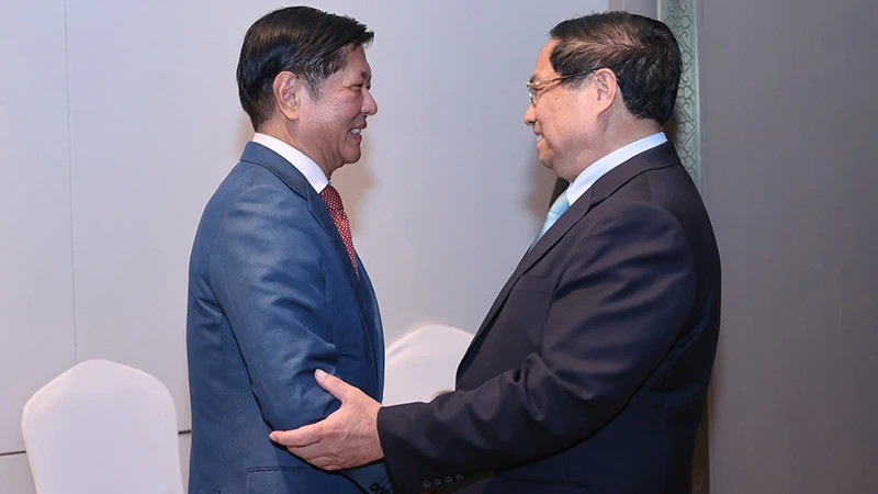 越南政府总理范明正与菲律宾总统费迪南德·罗慕尔德兹·马科斯。