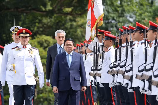 越南政府总理范明正2月8日至10日对新加坡进行正式访问。（图片来源：越通社）