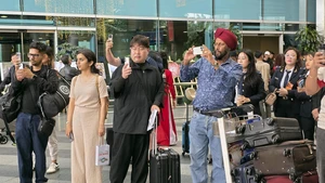 岘港国际机场的国际旅客。（图片：越通社）