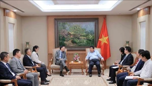 会见场景。（图片来源：越通社）