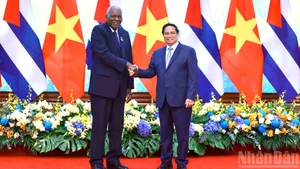 政府总理范明正会见古巴全国人民政权代表大会主席埃斯特万·拉索·埃尔南德斯。