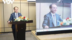 内务部副部长武战胜在会上发表讲话。（图片来源：越通社）