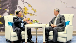 范明正总理会见柬埔寨首相洪玛奈。（图片来源：越通社）