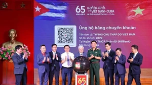主题为“越南-古巴情谊65周年”的“支持古巴人民行动”启动仪式。（图片来源：越通社）